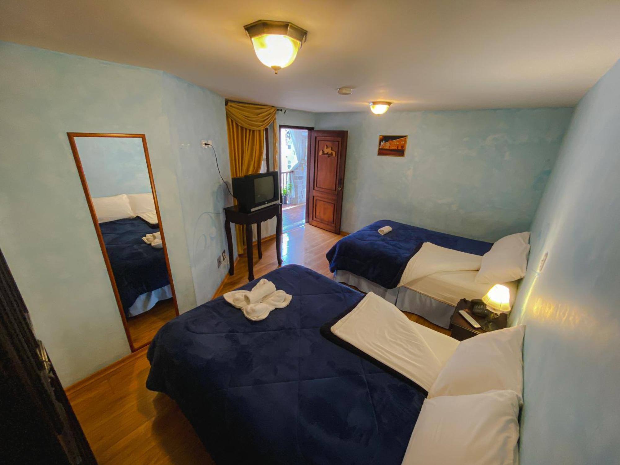 Golden Rest Latacunga Hotel Bilik gambar